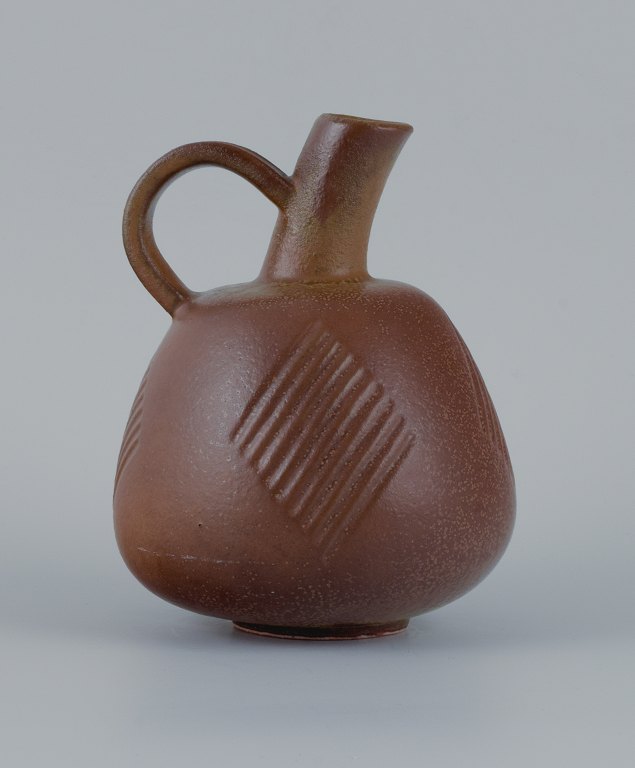 Nils Thorsson (1898-1975) for Royal Copenhagen, stoneware jug with brownish glaze.