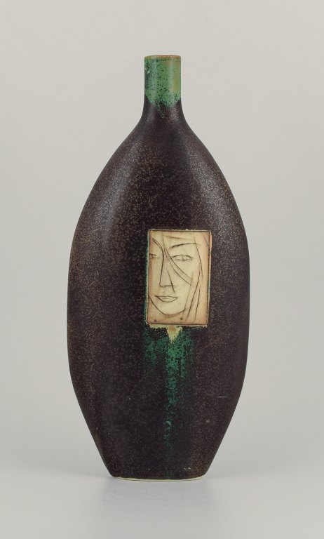 Pirjo Nylander, Finnish ceramist, tall unique ceramic vase with motif of a woman