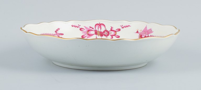 Meissen, Germany, Rich Court Dragon, large round bowl in purple with gold decoration.