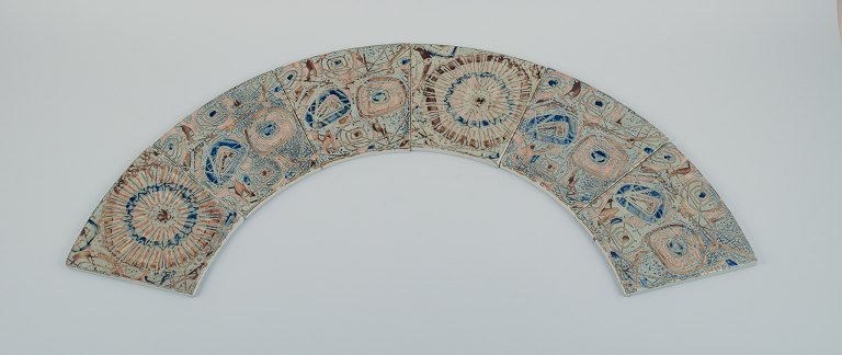 Royal Copenhagen, six Baca faience tiles with patterned glaze in brown, blue, green and sand colours.