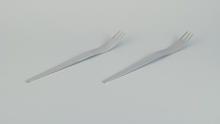 Arne Jacobsen for Georg Jensen. Modernist Arne Jacobsen cutlery.Two long salad forks in stainless steel.