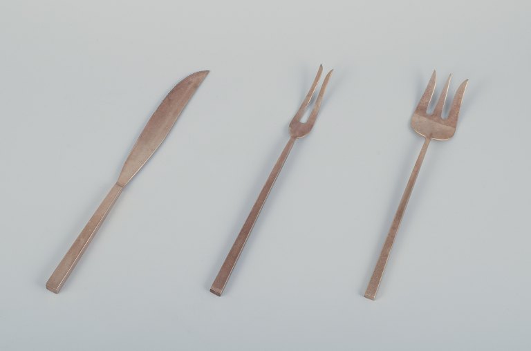 Sigvard Bernadotte "Scanline" brass flatware.Carving set and a carving fork. Three pieces.