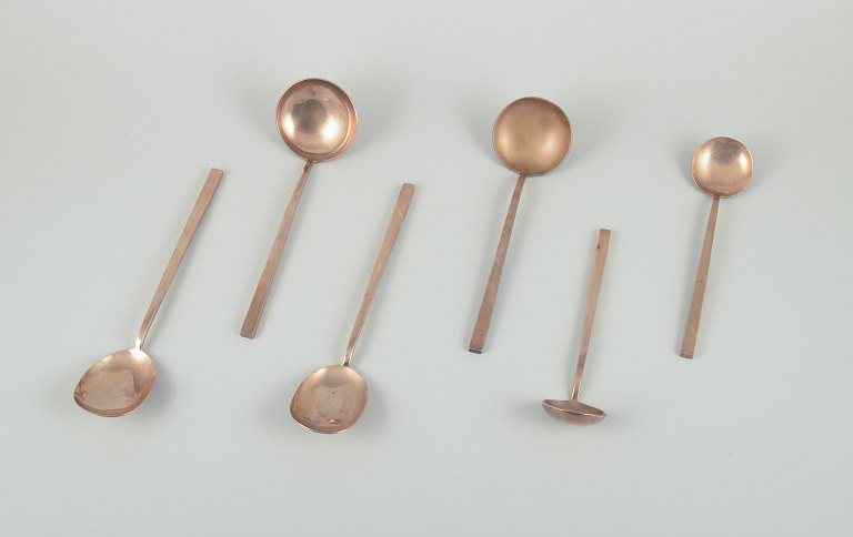 Sigvard Bernadotte "Scanline" brass flatware.Six pieces of serving utensils.