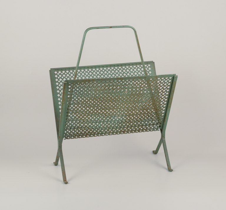 Mathieu Mategot (1910-2001), French industrial designer.Magazine holder in green-patinated metal.
