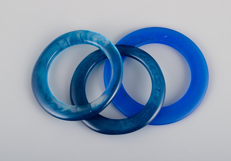 French jewelry designer.Three bracelets in blue plastic.