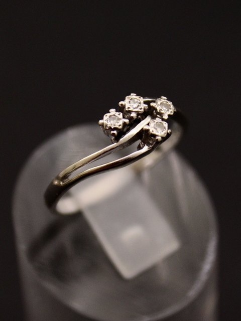 14 carat white gold ring with 4 diamonds
