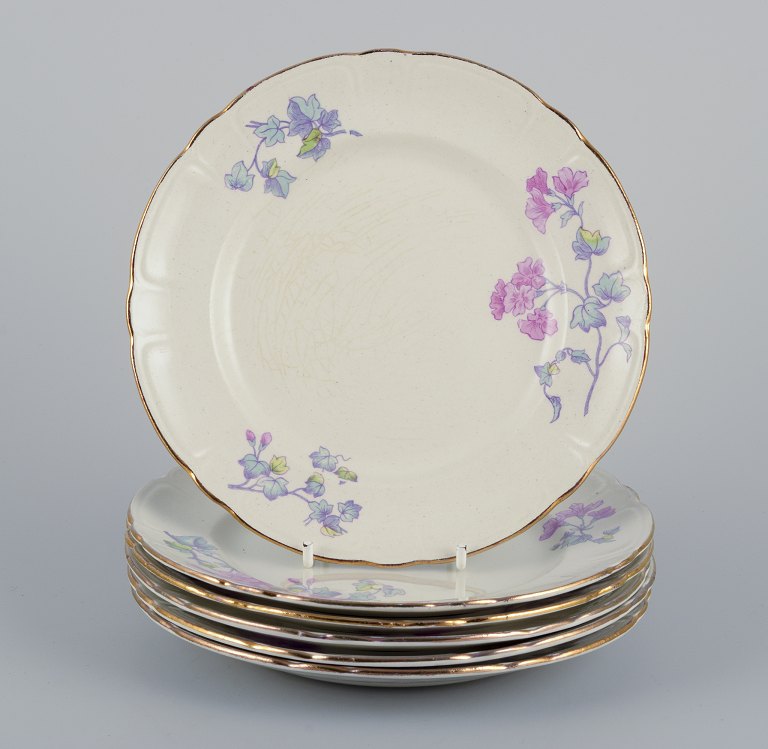 Gustafsberg, Sweden.A set of six flat earthenware ‘Geranium’ plates.