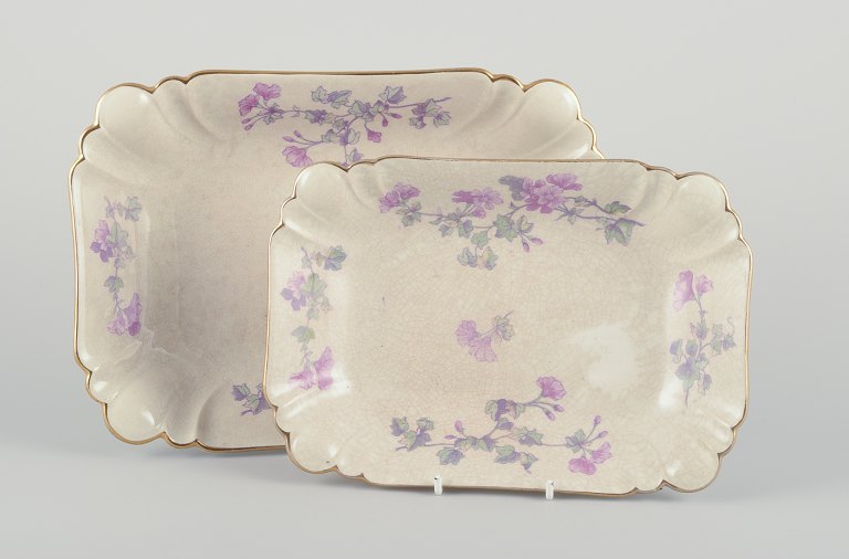 Gustafsberg, Sweden.Two elongated and deep "Geranium" faience dishes.