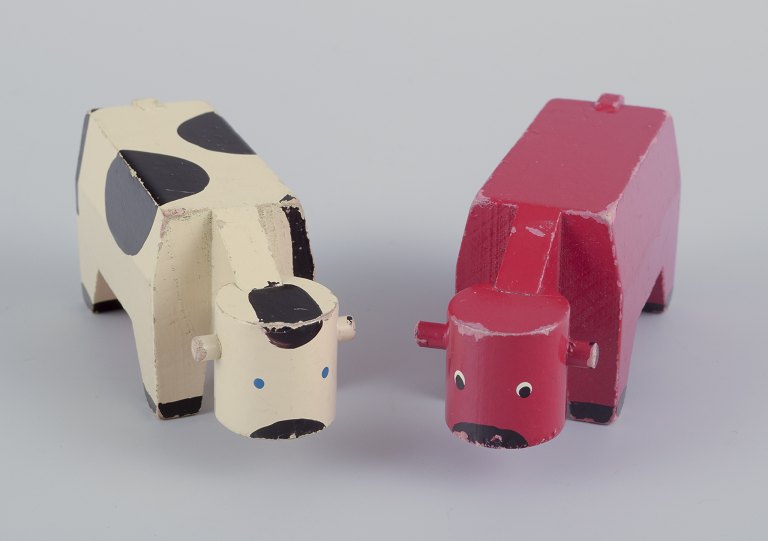 Kay Bojesen.Two early wooden figures in the shape of cows.