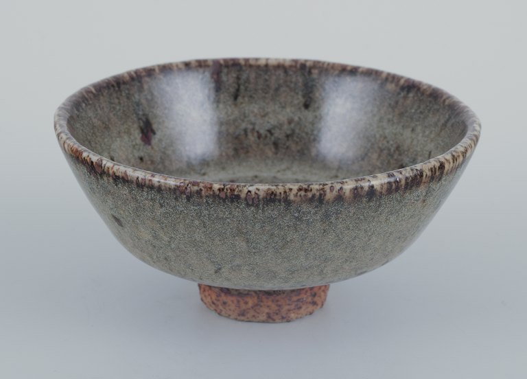 Nils Thorsson for Royal Copenhagen.Unique stoneware bowl on a base.