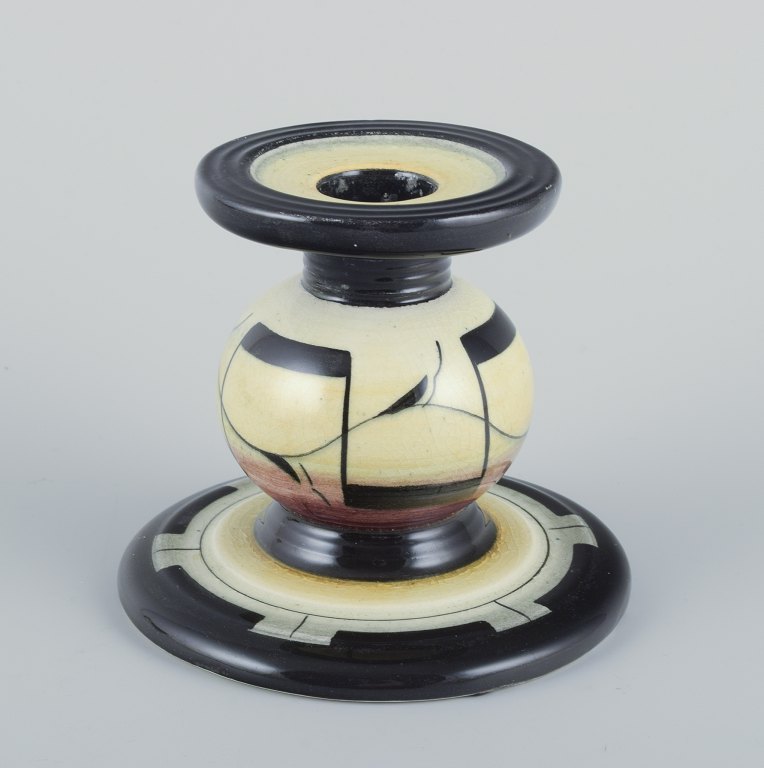 Ilse Claesson for Rörstrand.  
Lysestage i glaseret fajance.