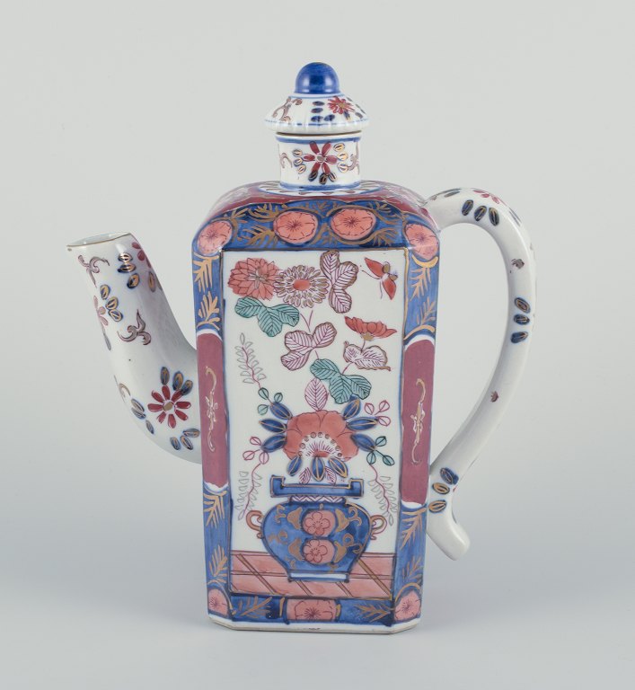 Asian coffee pot in porcelain.Hand-painted with polychrome glaze.