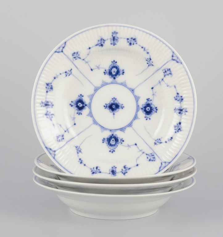 Bing & Grøndahl Blue Fluted. 
A set of four antique deep plates.