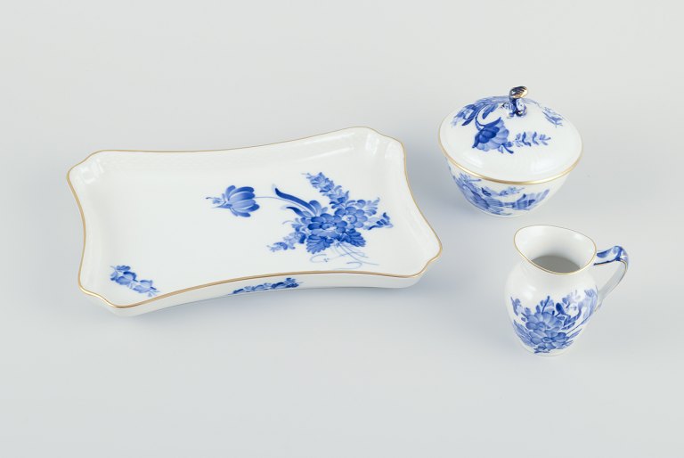 Royal Copenhagen Blue Flower Curved, sugar bowl and creamer on a tray.