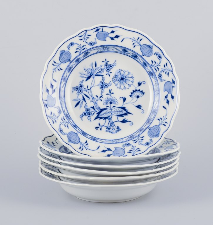 Meissen, Germany.A set of six deep porcelain plates with "Blue Onion" pattern.