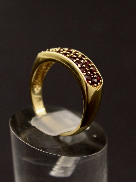 8 carat gold ring  with numerous garnets