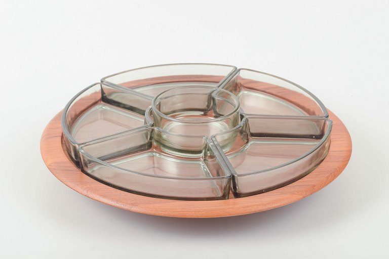 Digsmed, DenmarkCabaret tray in teak with eight hand-blown glass dishes.