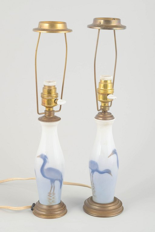 Pair of small table lamps in porcelain and brass, early 20th century.