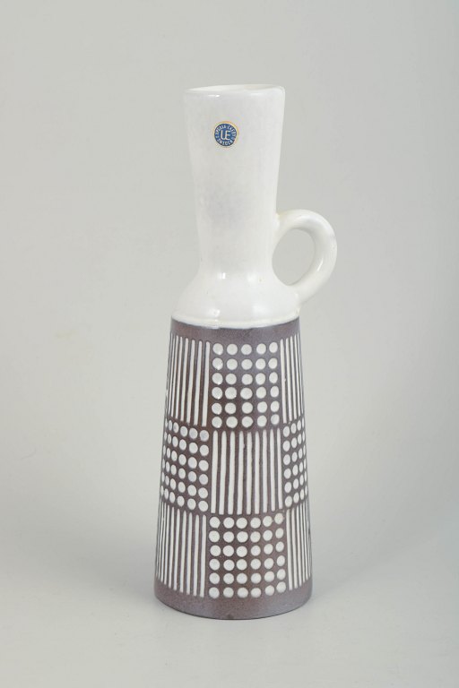 Mari Simmulson for Upsala Ekeby, pitcher.